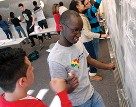 Picture of students at chalkboard