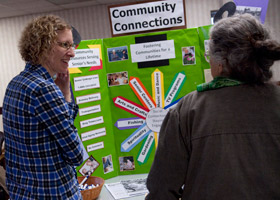 Picture of student talking to senior